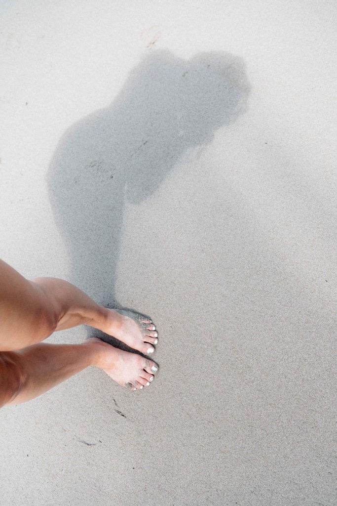 manuel antonio feet in the sand
